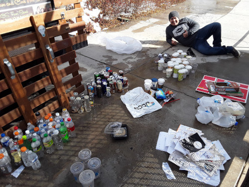 student conducting building waste audit