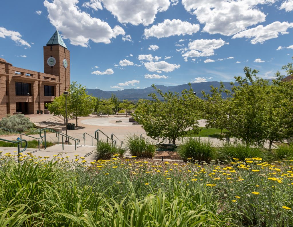 An image of the UCCS Campus with lush greenery.