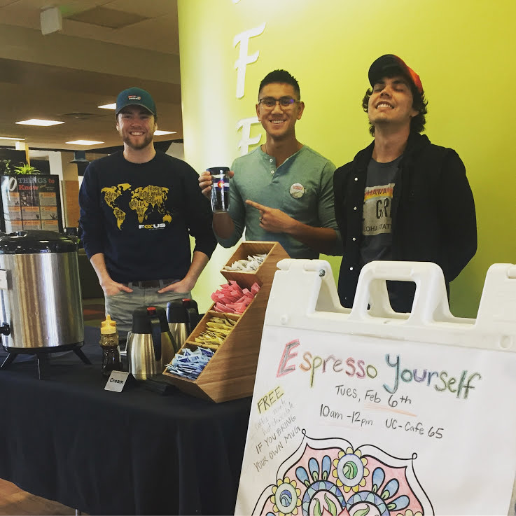 students handing out coffee at an Espresso Yourself event